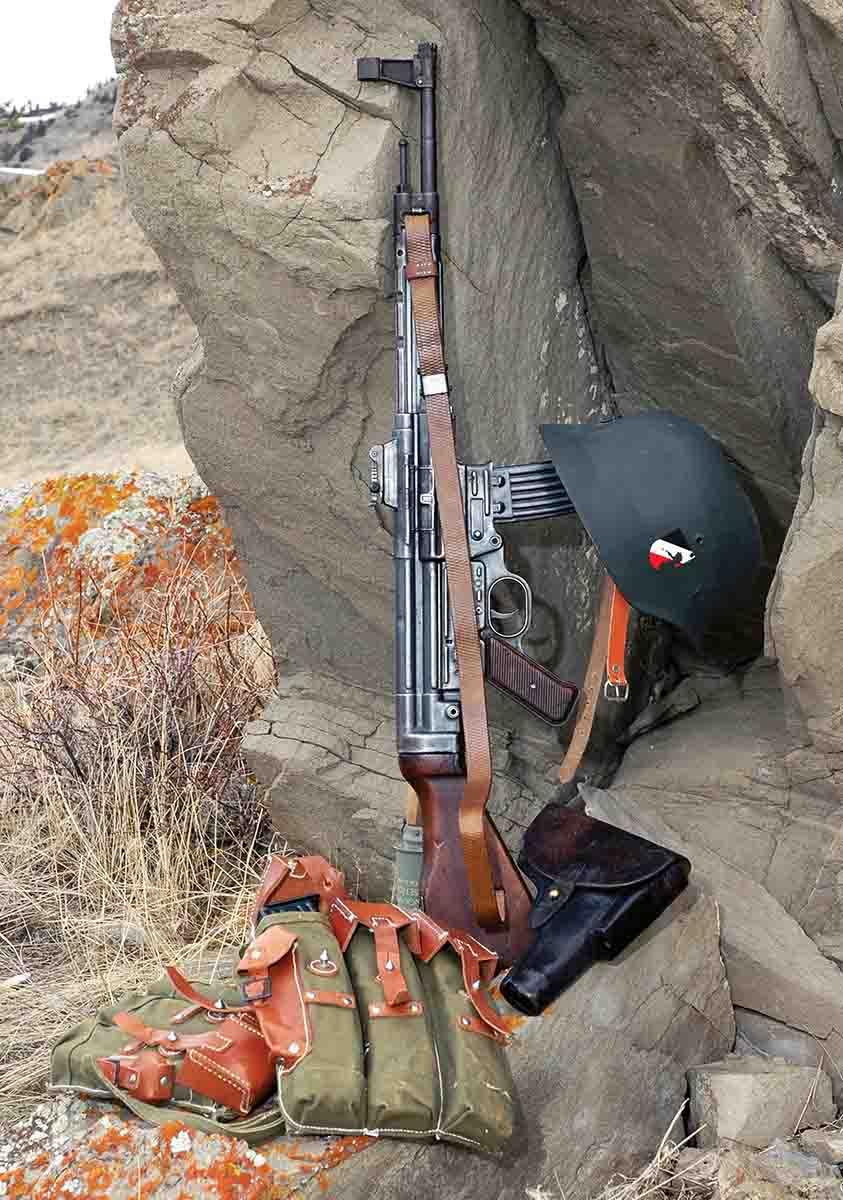 Mike’s MP44 is shown with various German World War II accouterments.